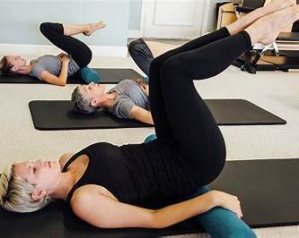 Pilates posture class focusing on alignment and core support